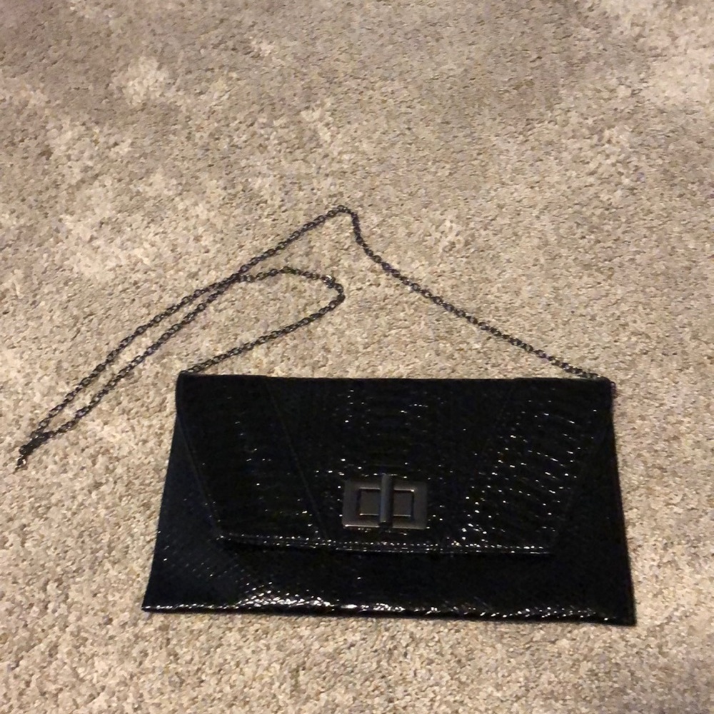 Boutique black snake skin envelope bag